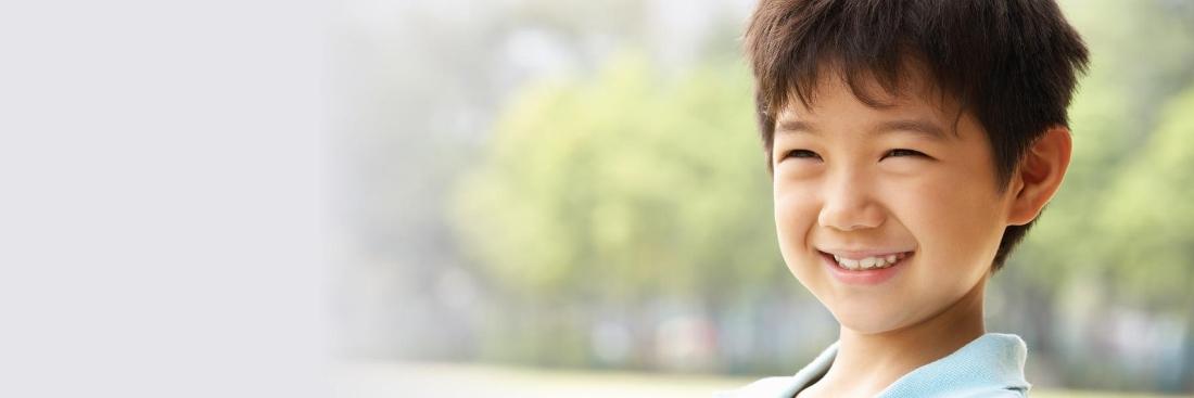 Kid smiling during a dental visit at Springs Family Dental
