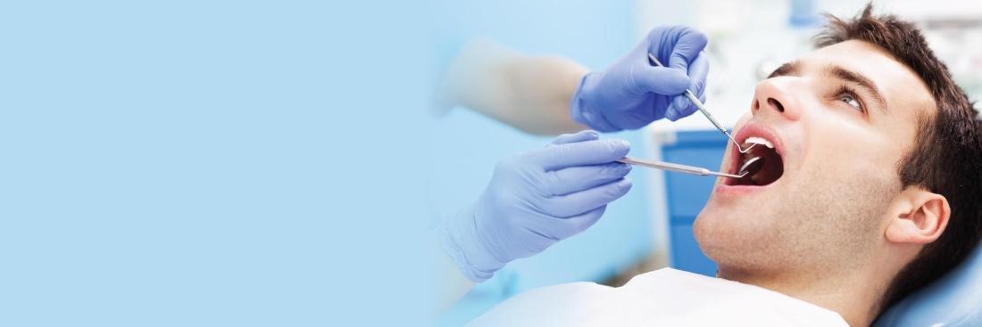 Man undergoing tooth extraction at Springs Family Dental