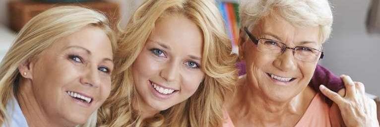 Friends smiling after teeth whitening in Colorado Springs