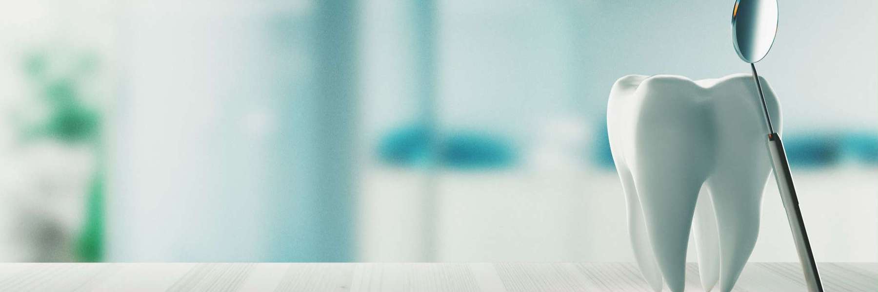 An impression of tooth and a dental tool used by the Best Dentist in Colorado Springs, CO