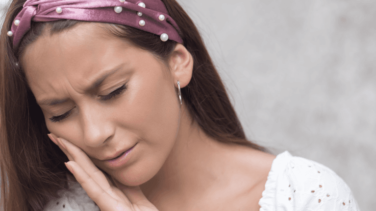 a lady with Emergency Dentistry in Colorado Springs, CO