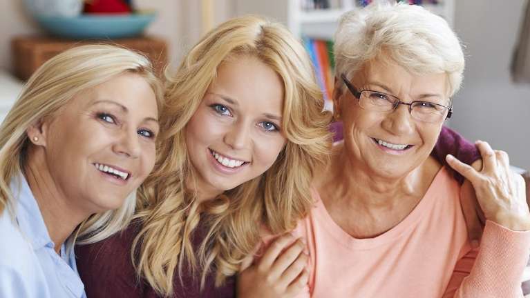 A photo of ladies smiling after dental session in Colorado Springs, CO.