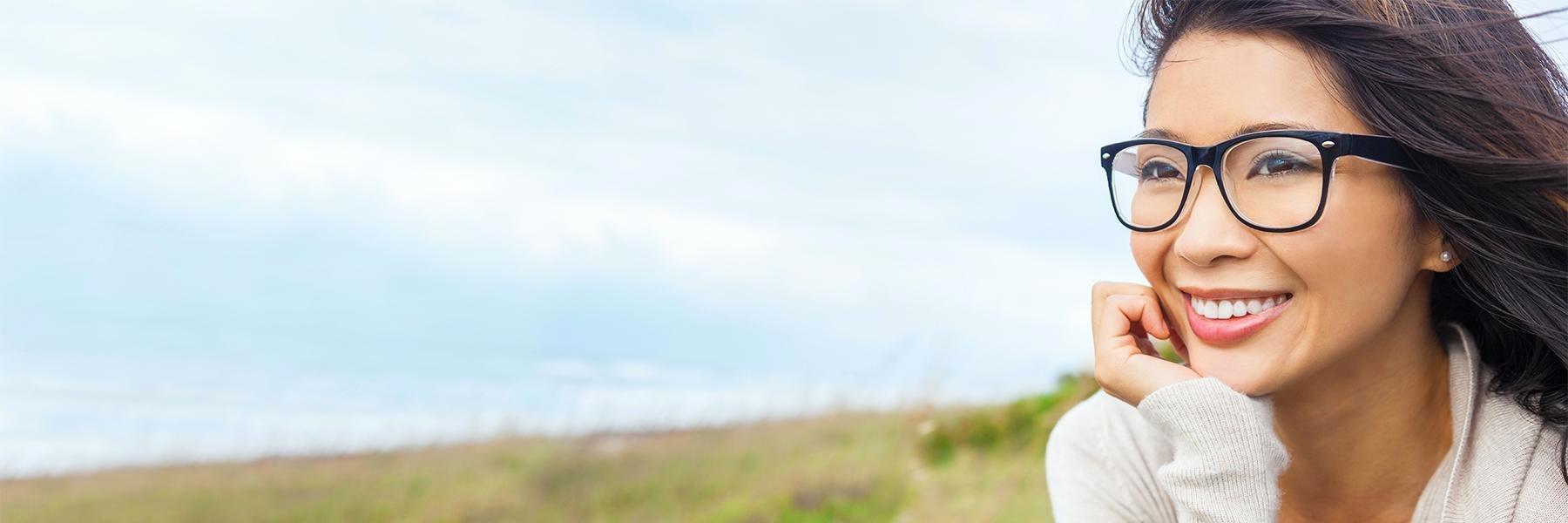 Woman smiling after brushing her teeth in Colorado Springs