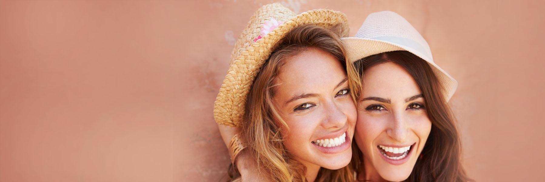 Two woman smiling