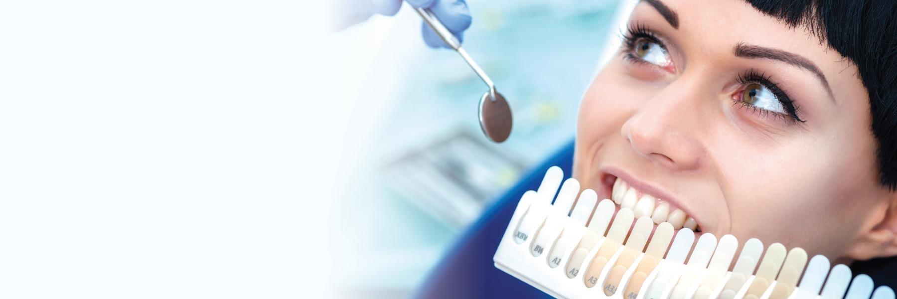 woman getting teeth whitened in colorado springs