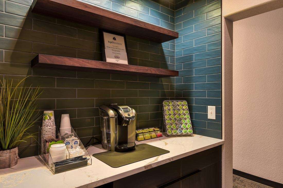 Photo of the kitchen with tumblers and a flask at Springs Family Dental